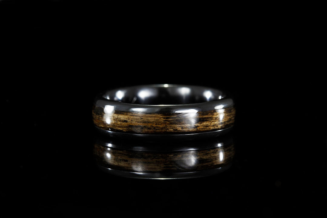 BLACK TITANIUM RING WITH WHISKEY BARREL WOOD