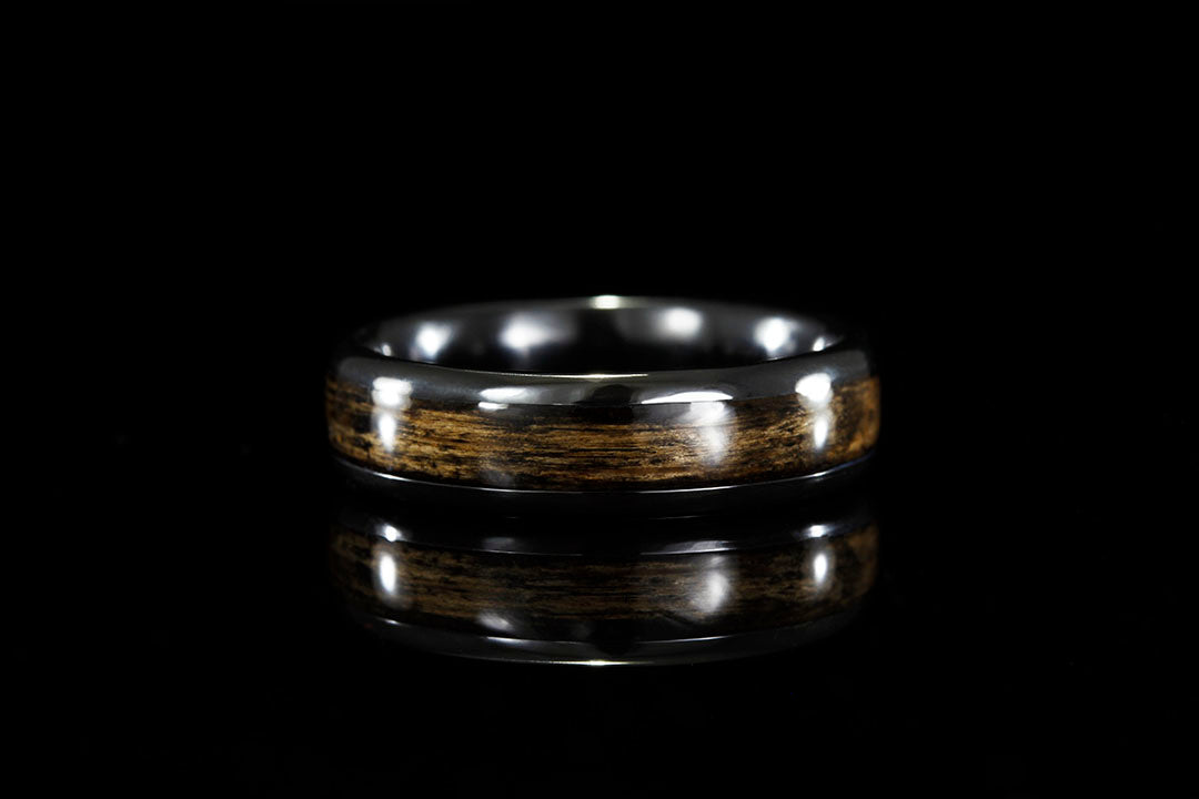 BLACK TITANIUM RING WITH WHISKEY BARREL WOOD