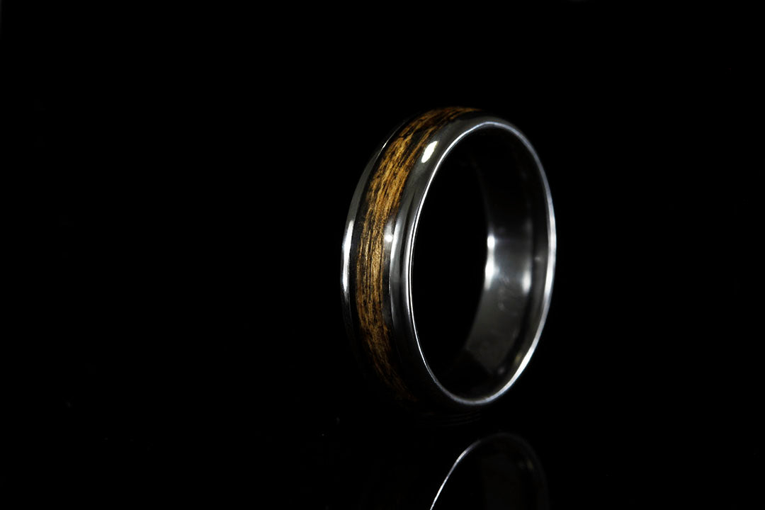 BLACK TITANIUM RING WITH WHISKEY BARREL WOOD
