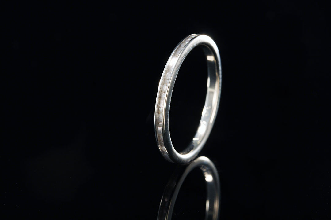 Woman's pearl ring, upright view, Chasing Victory