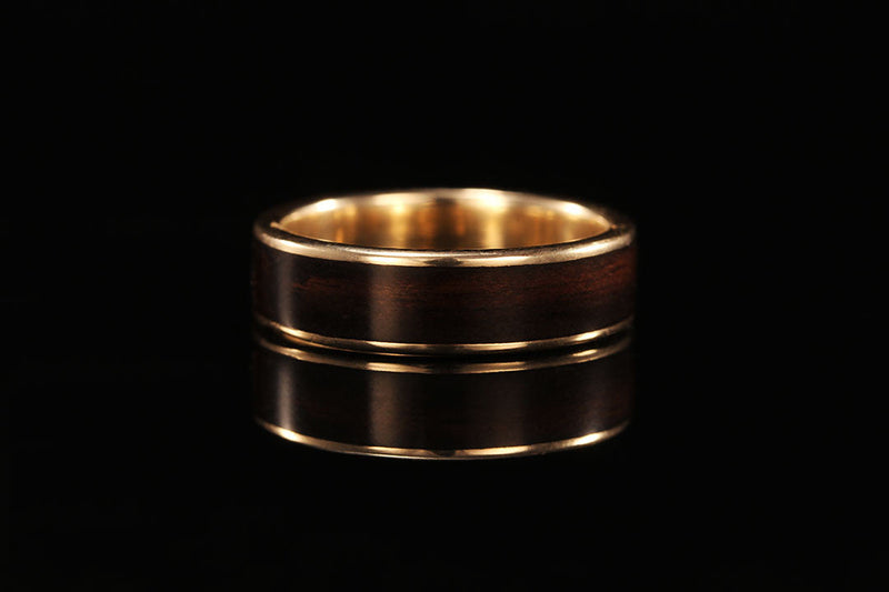 gold and wood ring for a man, wedding ring. golden interior, dark ebony wood band