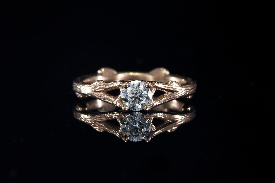 Top View of clear diamond rose gold twig engagement ring