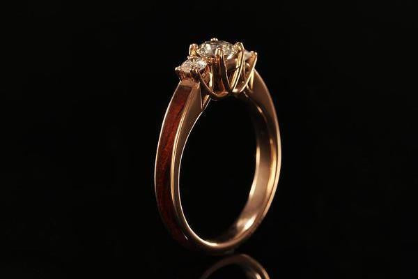 Women's Wood Engagement Ring with diamonds and rose gold, upright view, golden interior band, Chasing Victory