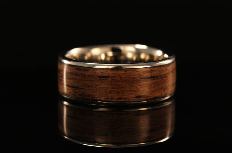 men's wooden and platinum wedding ring, wedding band, dark barrel wood, golden interior band