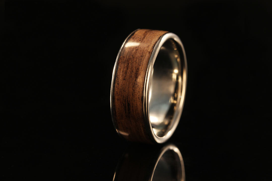 platinum and wooden wedding upright view of ring, Chasing Victory, gold interior band