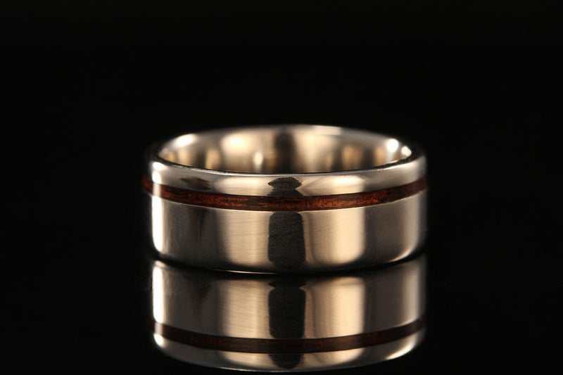 Men's wooden ring with black background