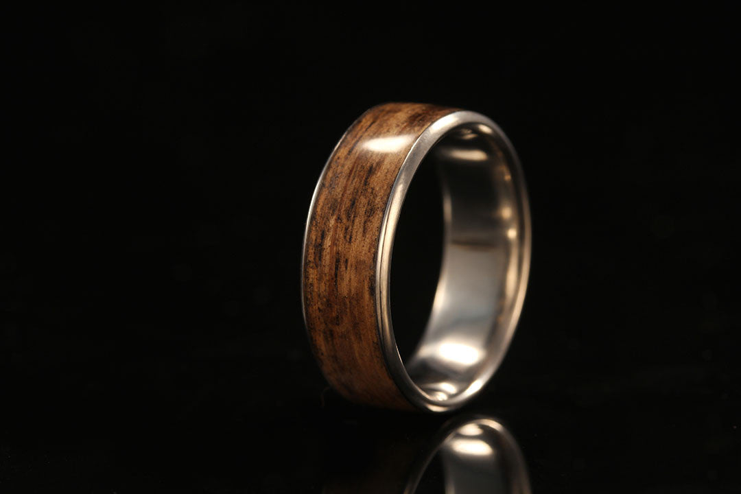 Whiskey Barrel wood wedding ring, upright view, light wood band