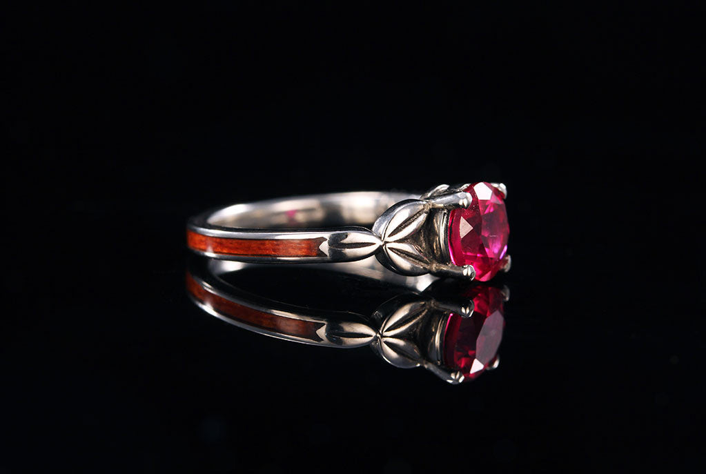 ruby leaf ring, side view, silver and wooden band