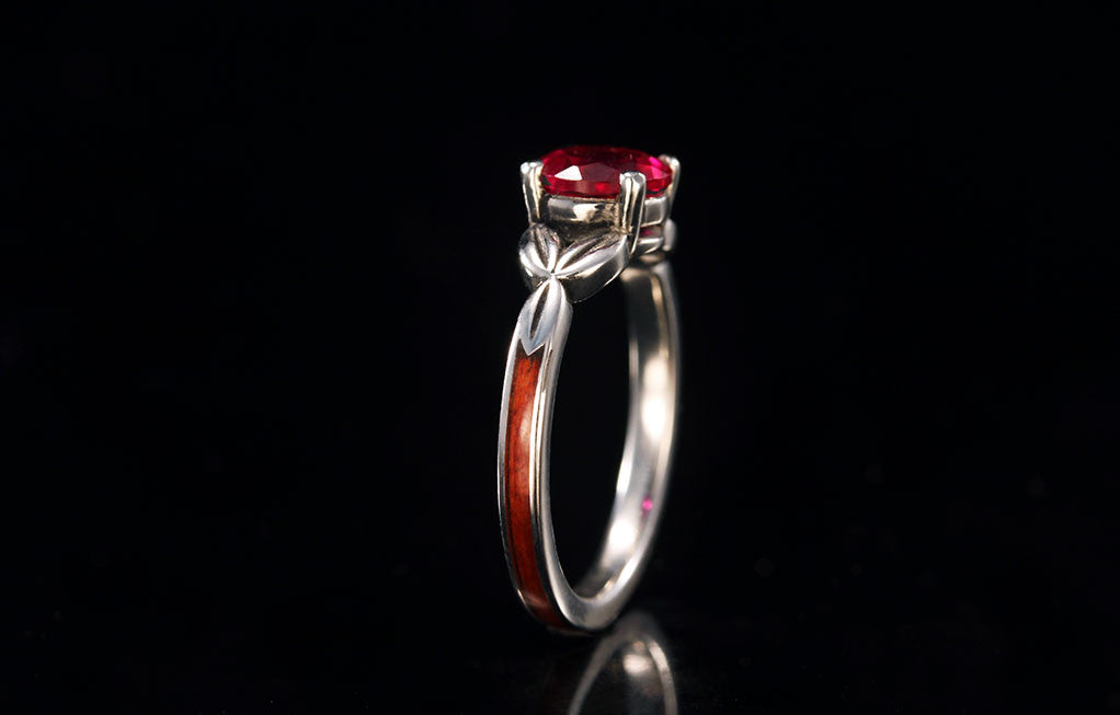 Wood and white gold redheart ring, upright view, silver interior, Chasing Victory