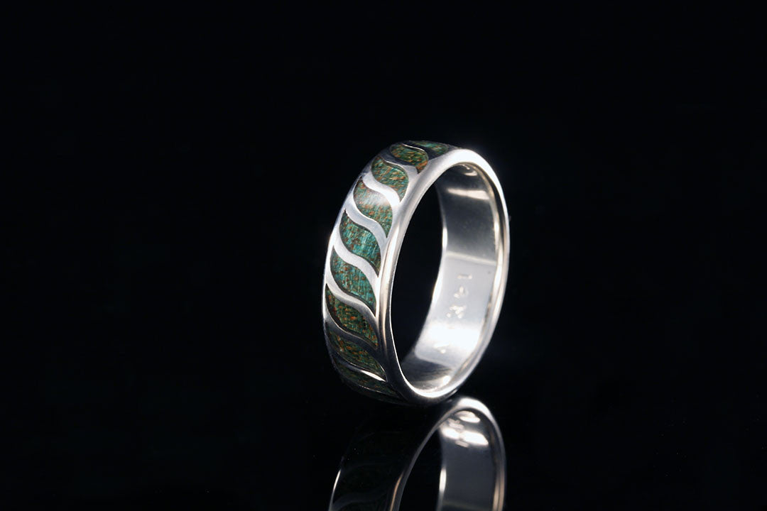 White gold band with wood inlay, upright view, silver inner band