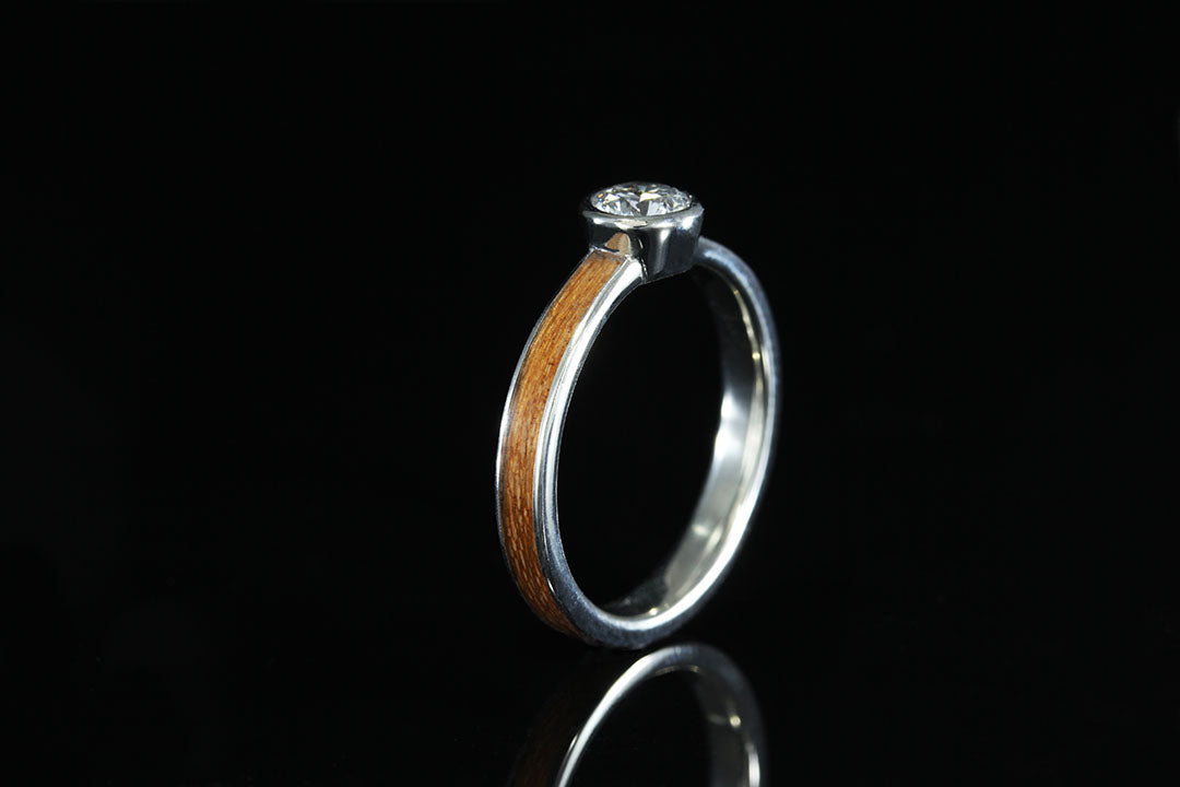 Upright view of cherry wood diamond ring, 14K Gold Bezel Set Diamond Cherry Wood Ring, Chasing Victory, silver lining