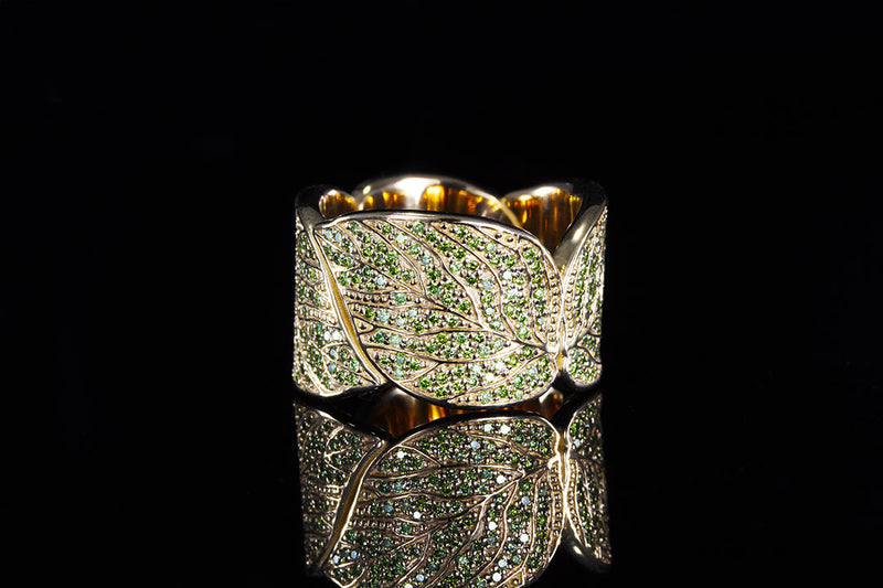 aspen leaves, with yellow gold and green diamonds for women