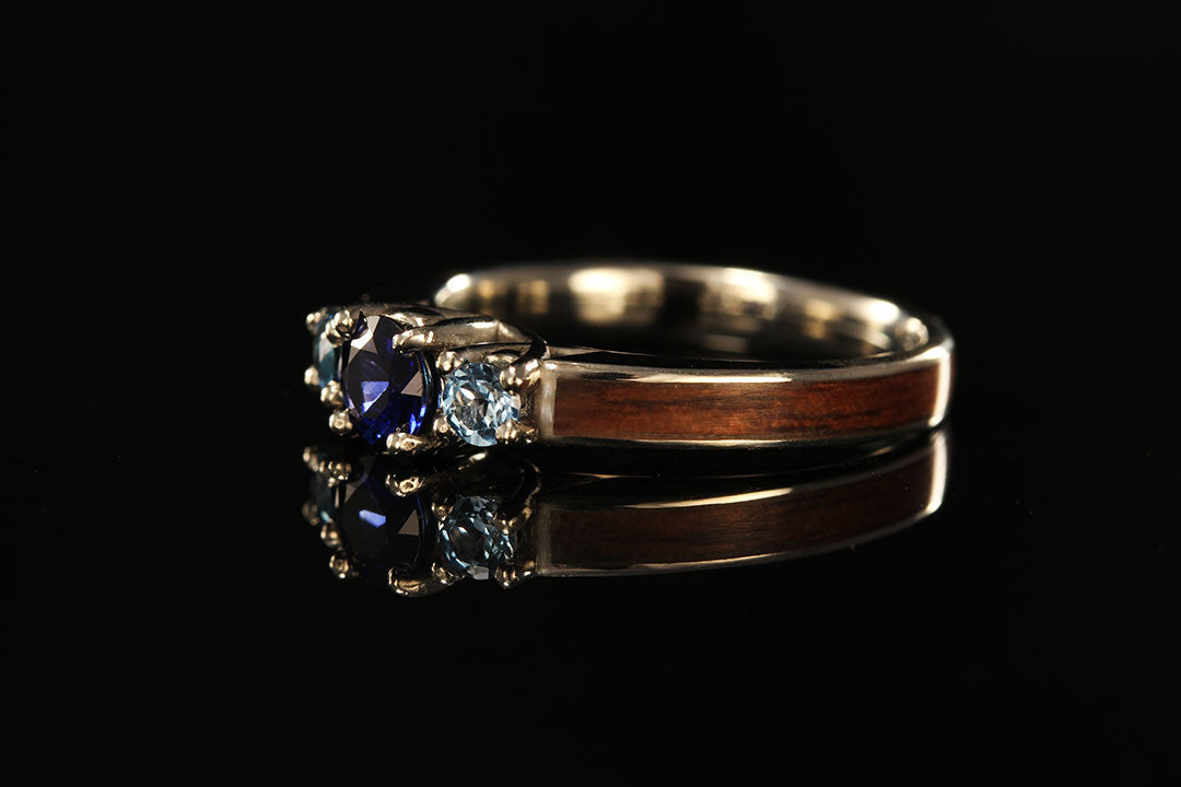White Gold Sapphire and Topaz Engagement Ring, wedding ring, side view, walnut wood band