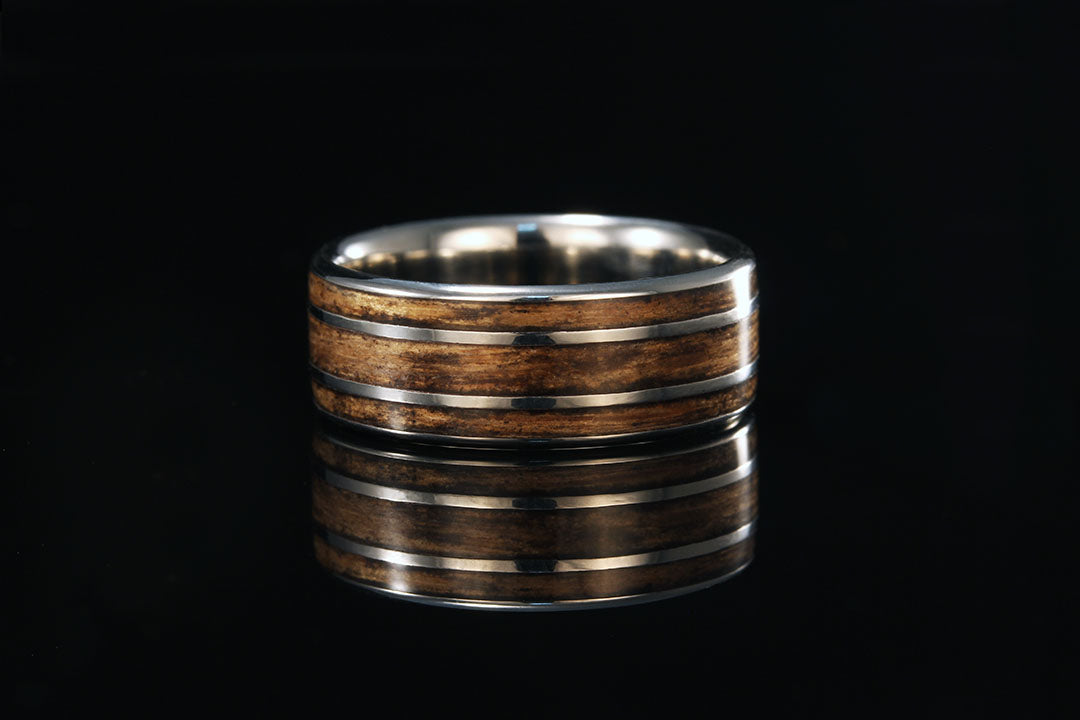 Men's Titanium ring inlaid with Jack Daniel's Tennessee Whiskey Barrel Wood. An ideal ring for any man.